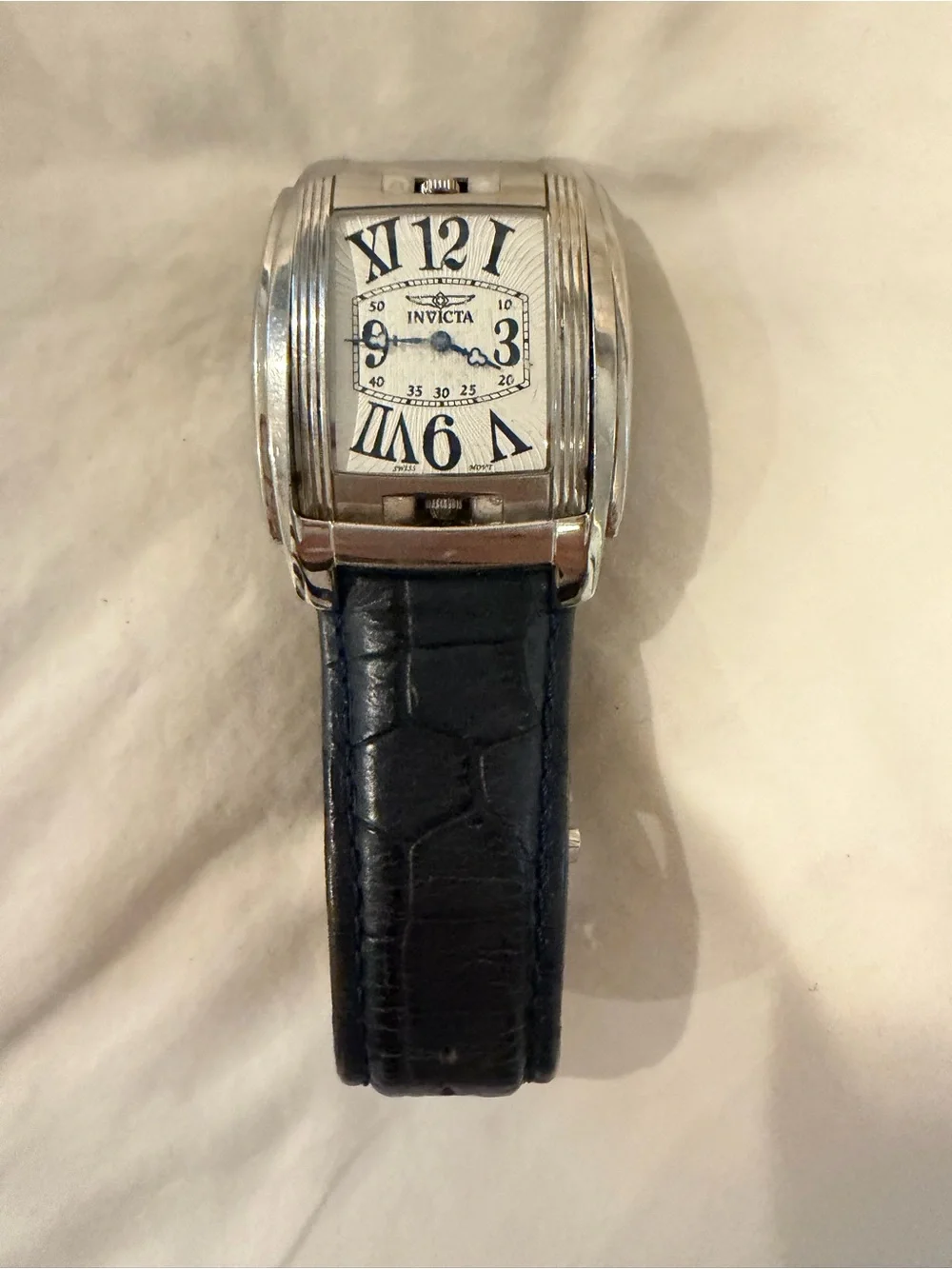 Invicta Men’s Silver Case Watch with Black Leather Strap Model 4224